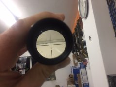 Fitting optics and sightin in a crossbow